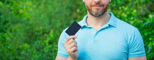 cropped-view-of-guy-hold-card-businessman-with-empty-card-man-showing-visit-card