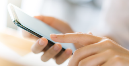 business-hand-with-mobile-phone (1)