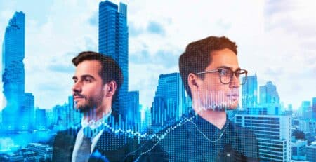 two-entrepreneurs-in-suits-pondering-about-new-venture-capital-and-hitech-start-up-and-try-to-forecast-risks-and-estimate-prospective-earning-growth-hologram-chart-on-bangkok