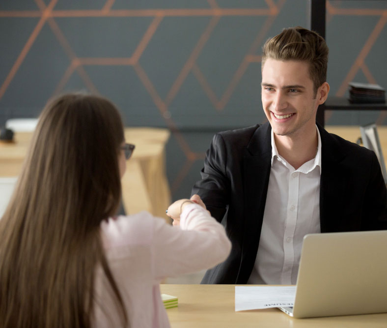 smiling-hr-employer-handshaking-successful-job-applicant-hiring-or-greeting smiling-hr-employer-handshaking-successful-job-applicant-hiring-or-greeting