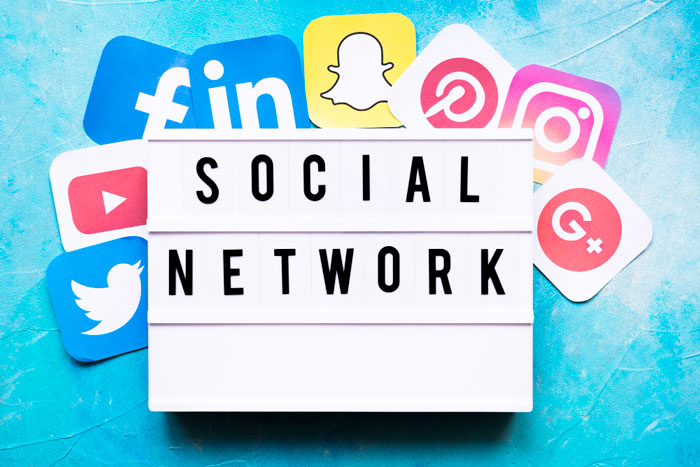 social-network-text-with-networking-application-icons-on-painted-wall social-network-text-with-networking-application-icons-on-painted-wall
